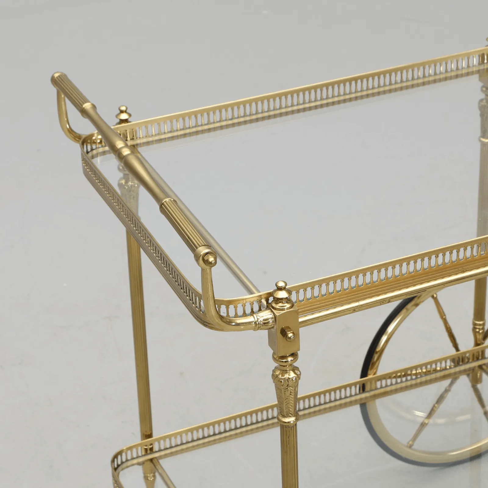 An Antique Brass and Glass Trolley