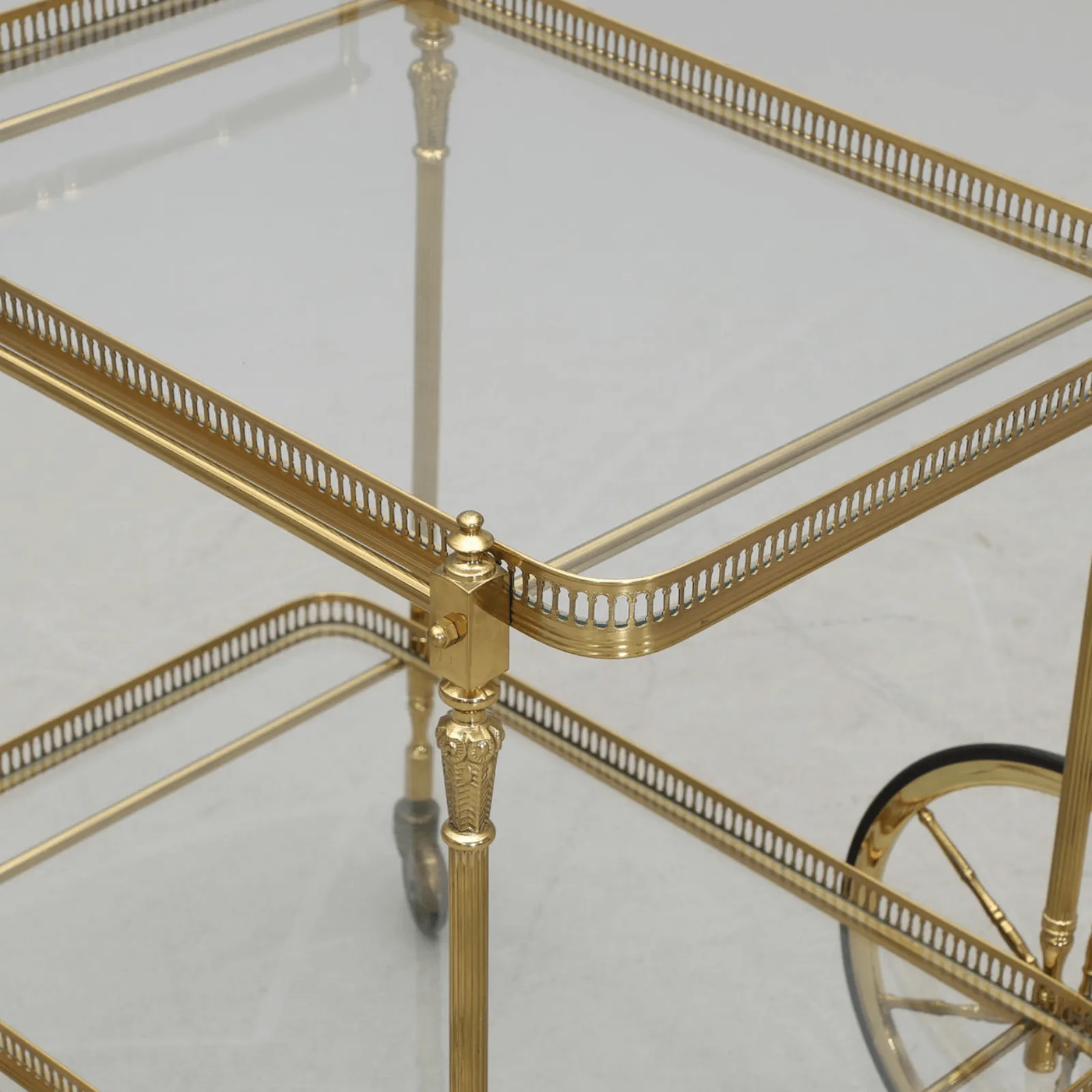 An Antique Brass and Glass Trolley