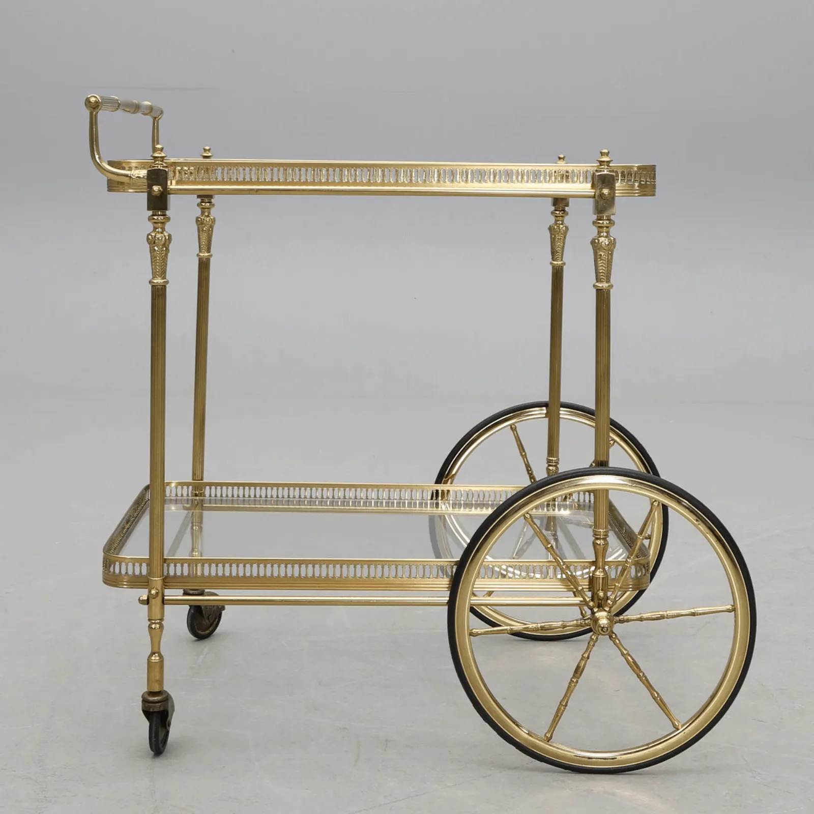 An Antique Brass and Glass Trolley