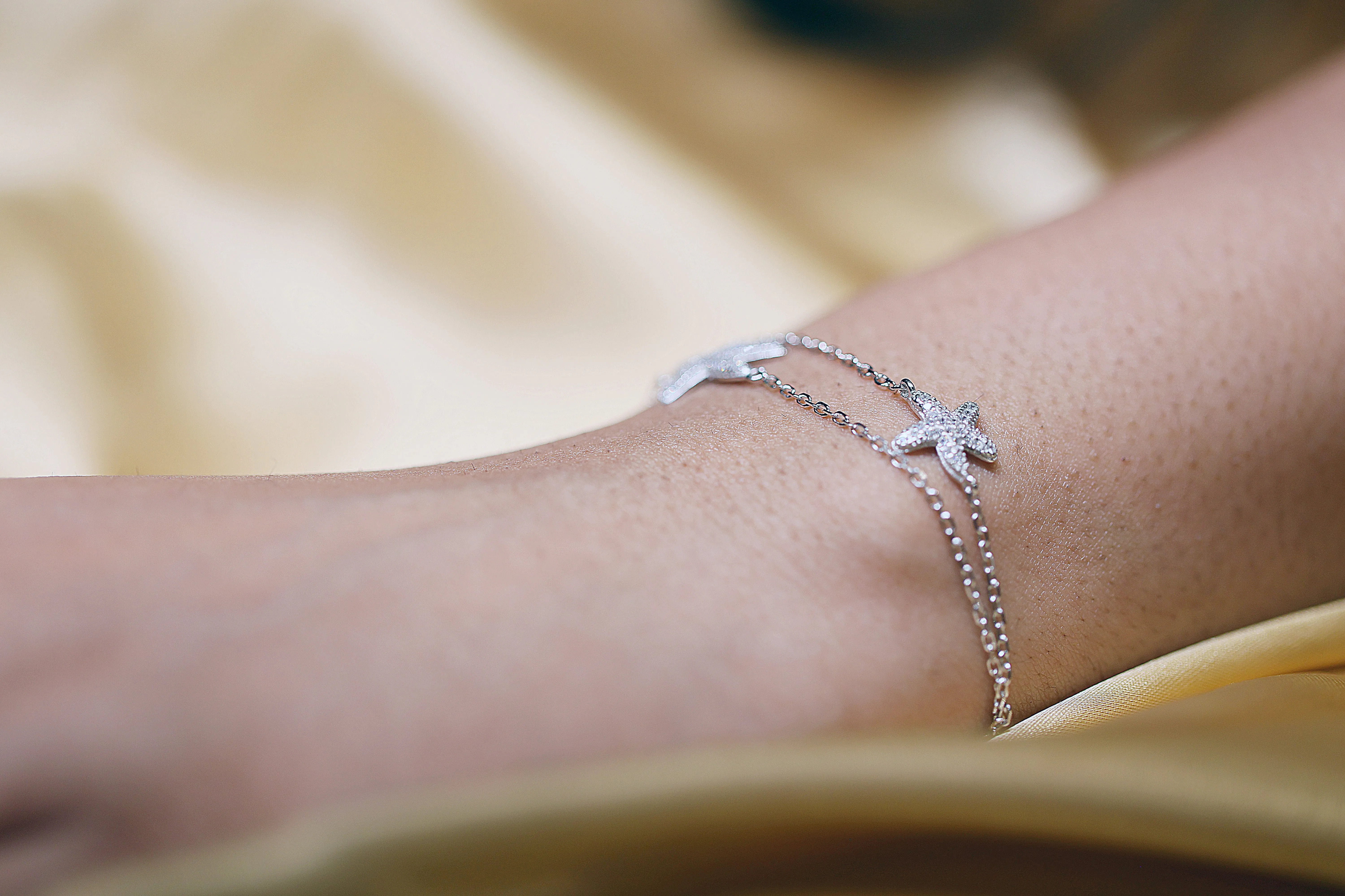 Silver dual strand starfish bracelet