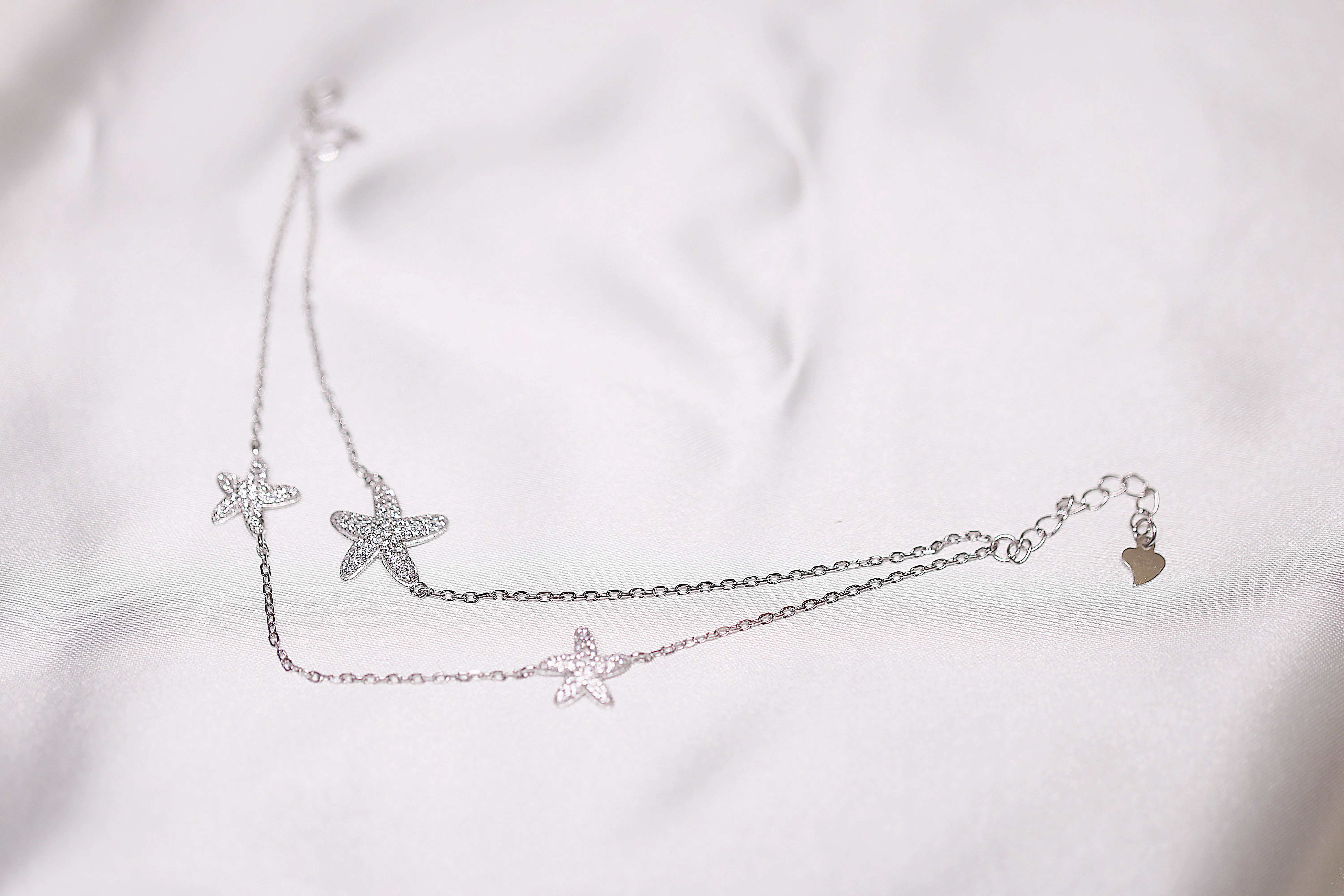 Silver dual strand starfish bracelet